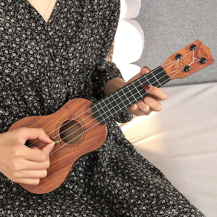 Mini Acoustic Ukulele Bowlift