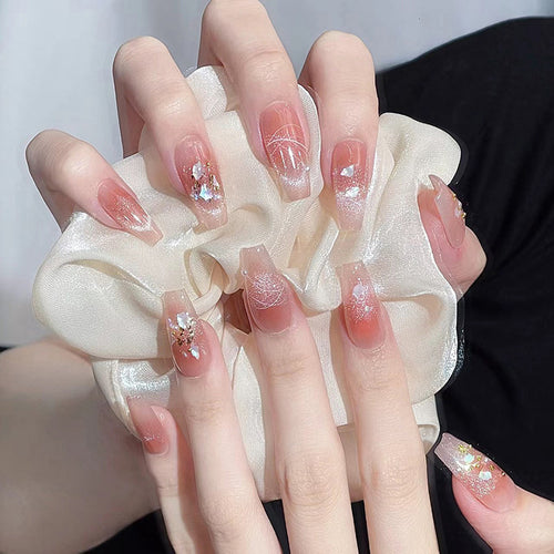 Artificial nail set with elegant glitter and flower decorations Bowlift