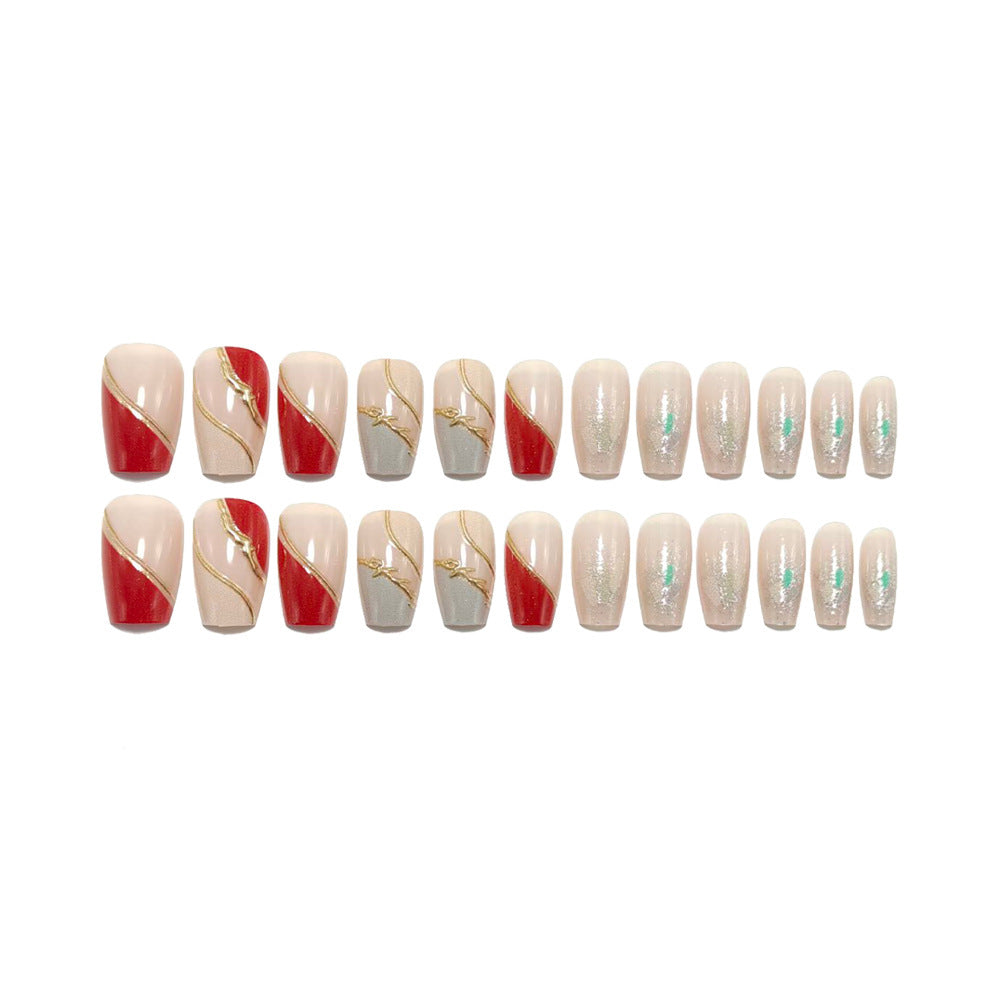 Artificial nails with elegant gold pattern and glitter accents Bowlift