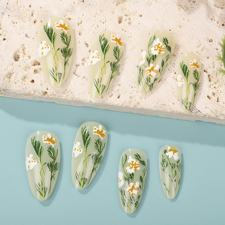 Handmade art nails with floral accents Bowlift