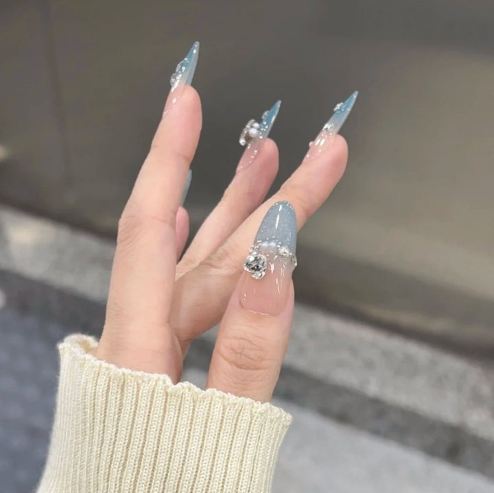 Artificial nails with modern glitter design Bowlift