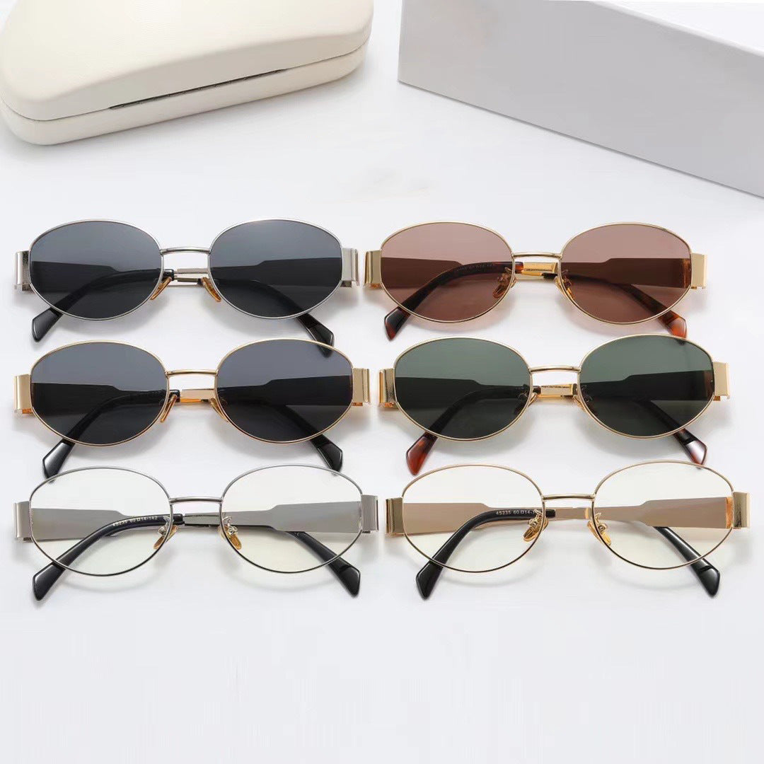 Women elegant oval sunglasses with gold-colored frame Bowlift