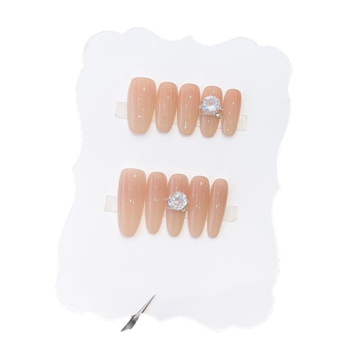 Artificial nails with stylish rhinestone detail Bowlift