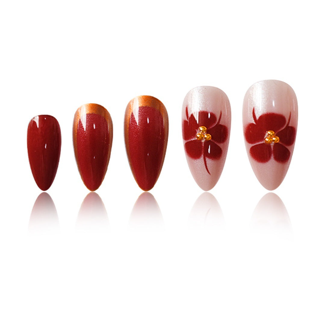 Artistic Press-On Nail Art Set with Floral Accents Bowlift