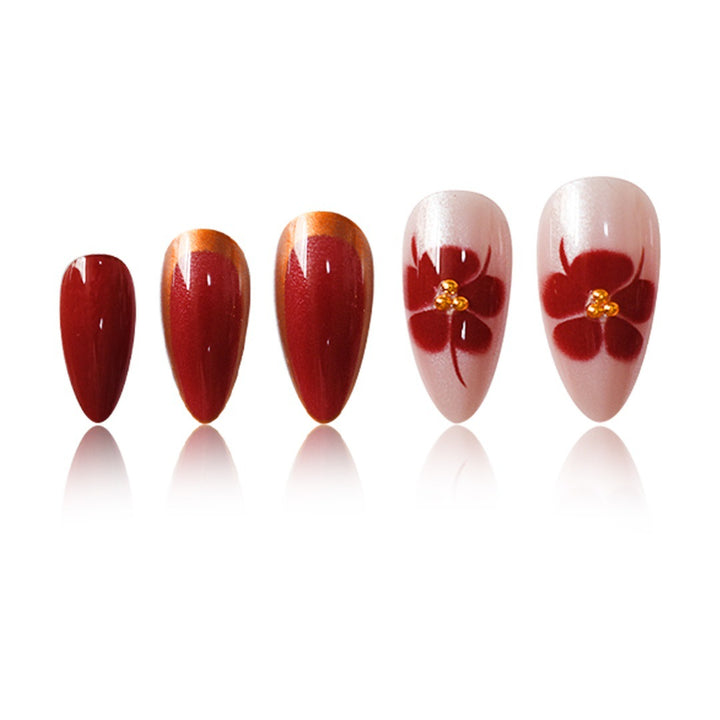 Artistic Press-On Nail Art Set with Floral Accents Bowlift