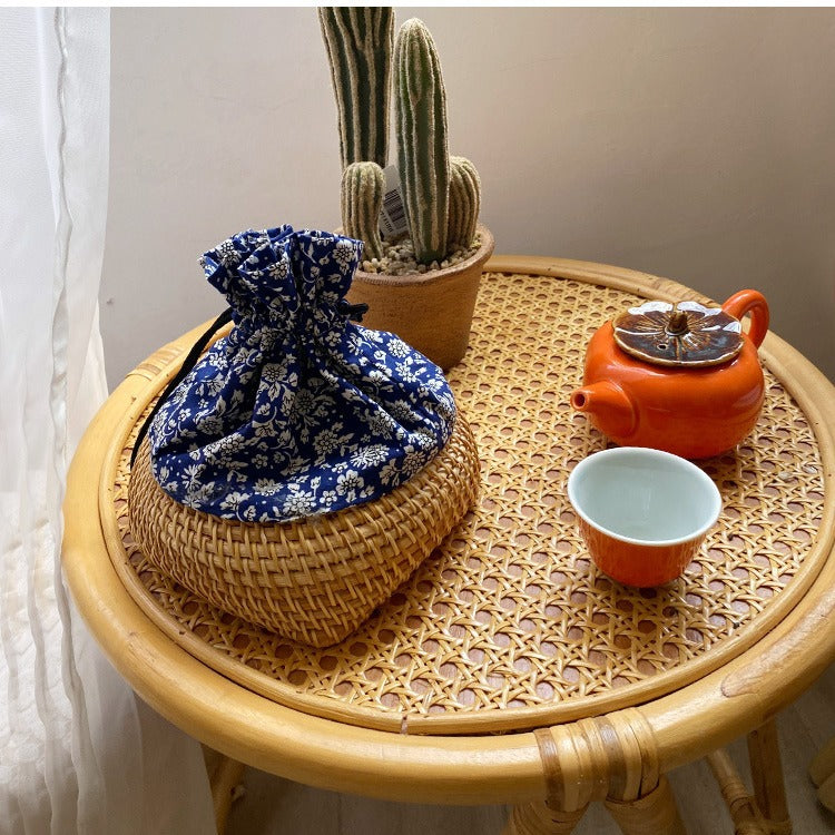 Charming storage bag made of hand-woven rattan Bowlift