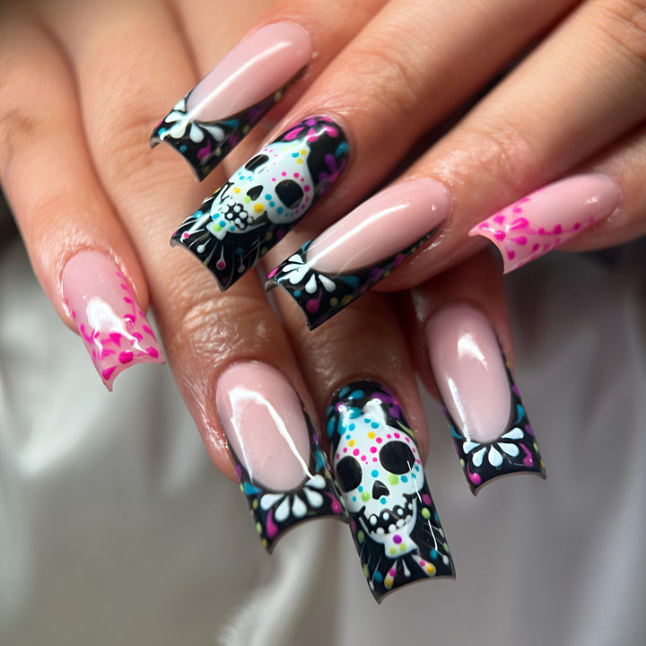 Creative nail art with detail-loving skull design Bowlift