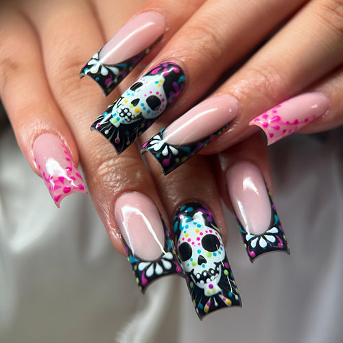 Creative nail art with detail-loving skull design Bowlift