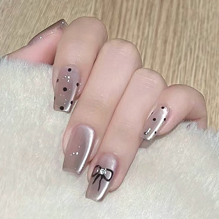 Artful Nail Extensions with Colorful Bow Motifs Bowlift