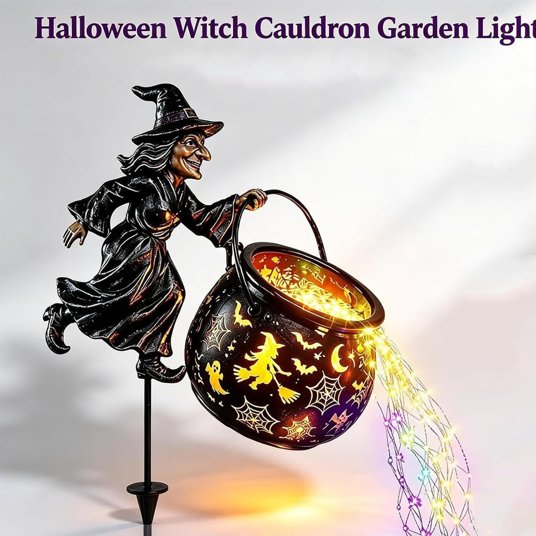 Garden decoration with illuminated witch figure Bowlift