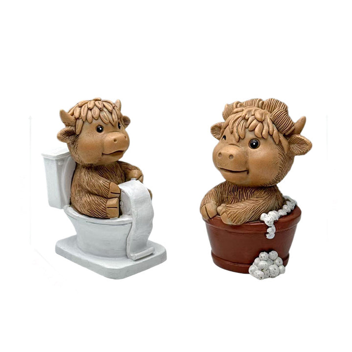 Funny decorative figure of a Highland cow on toilet Bowlift