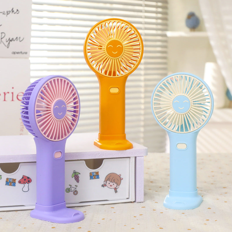 Ladies portable USB hand fan with innovative smiling design Bowlift