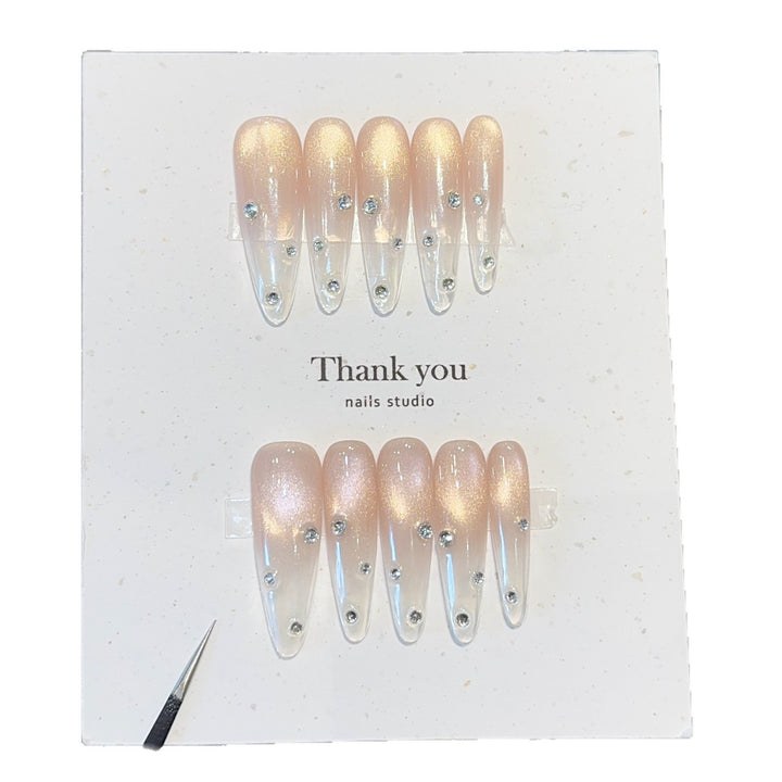 Artificial nails with shimmering accents and elegant rhinestone details Bowlift
