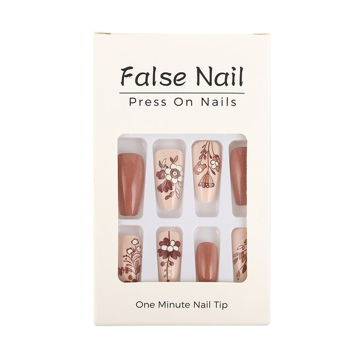 Artificial nails with filigree flower designs Bowlift