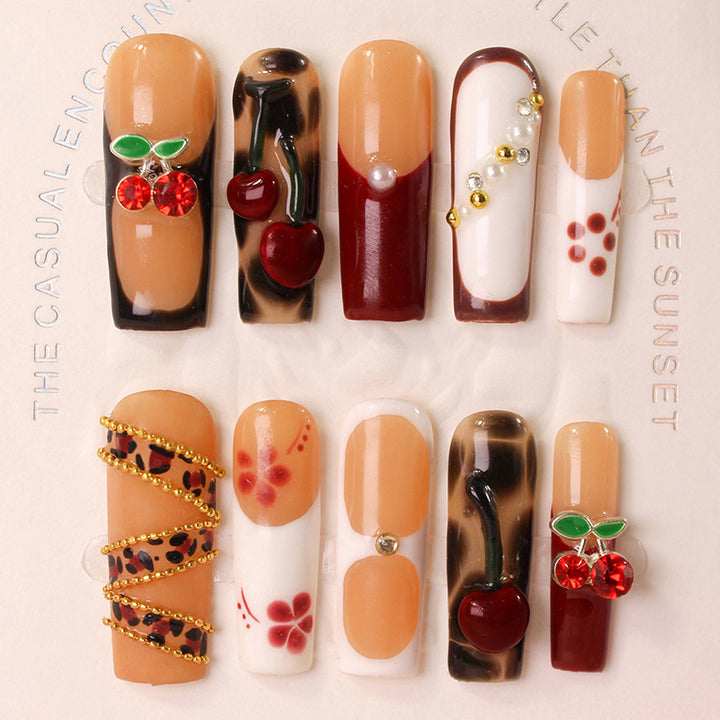 Nail art set with luxurious cherry and glitter accents Bowlift
