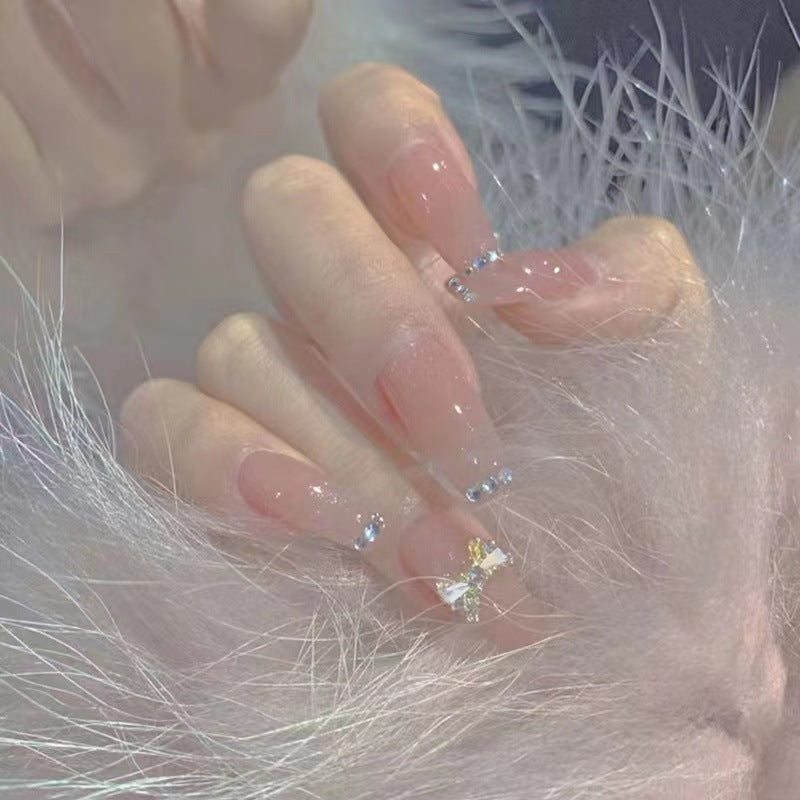 Artificial nails with elegant rhinestone embellishments Bowlift