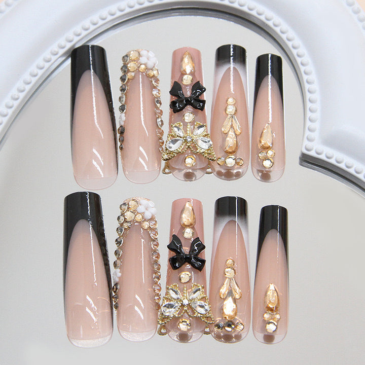 Artificial nail set with elegant 3D decorations and crystal accents Bowlift