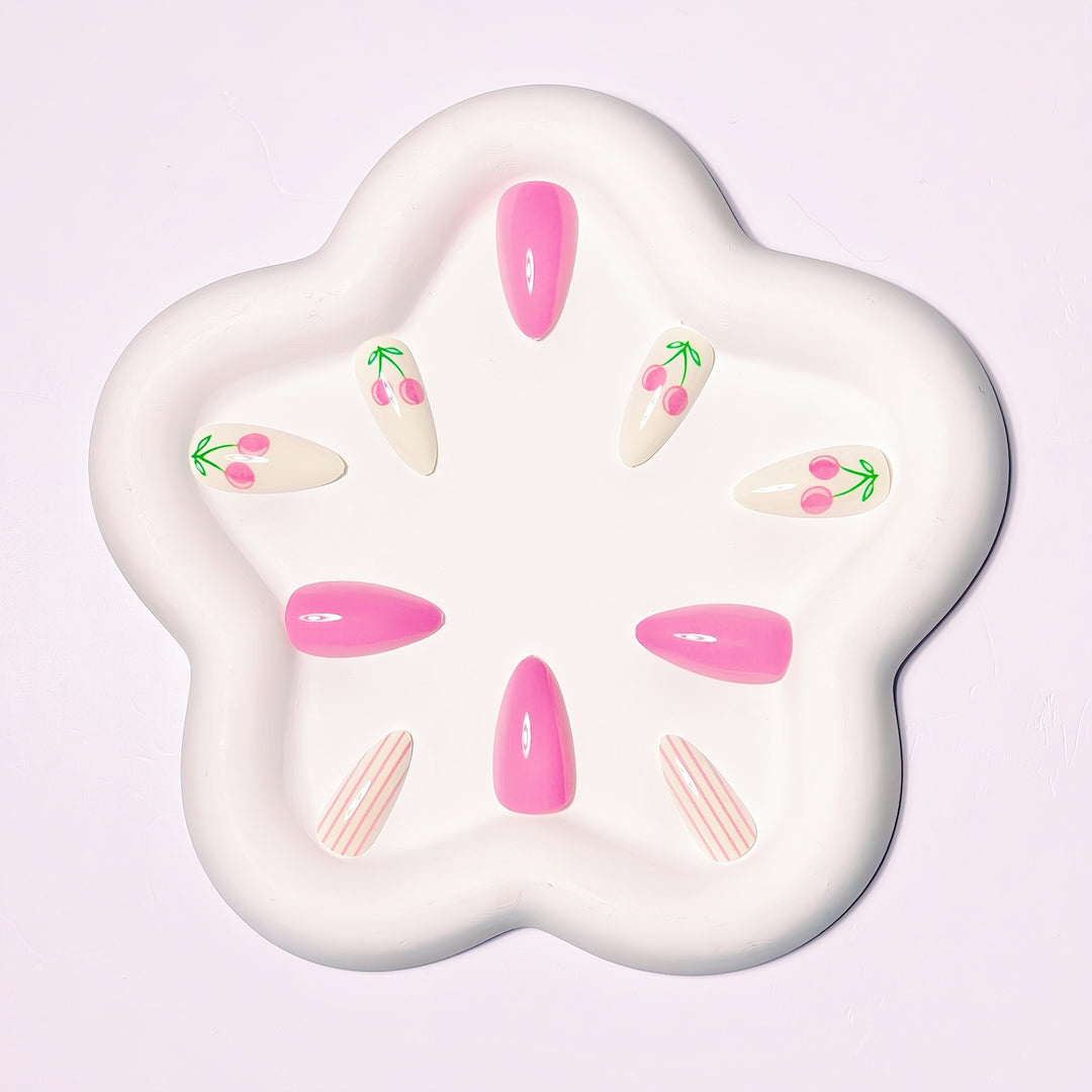 Artificial nails with fruity cherry design and striking colors Bowlift