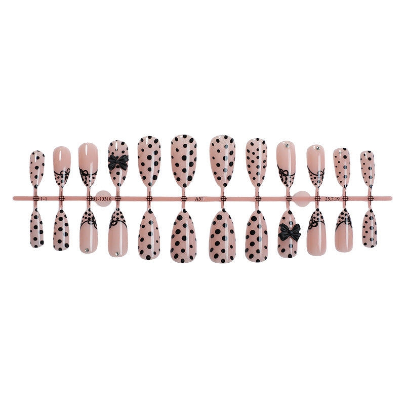 Artistic Press-On Nail Set with Polka Dot and Bow Designs Bowlift