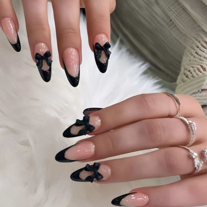 Artistic Stiletto Press-On Nail Design with Bow Accents Bowlift