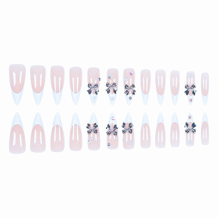 Acrylic nail set with elegant bows and sparkling accents Bowlift