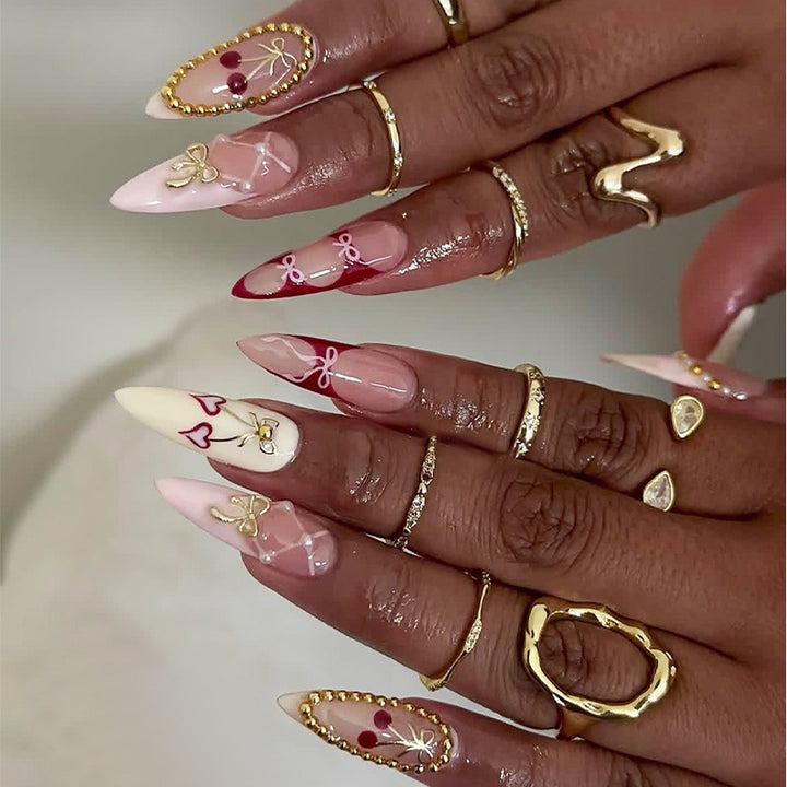 Creative nail art set with playful heart and bow accents Bowlift