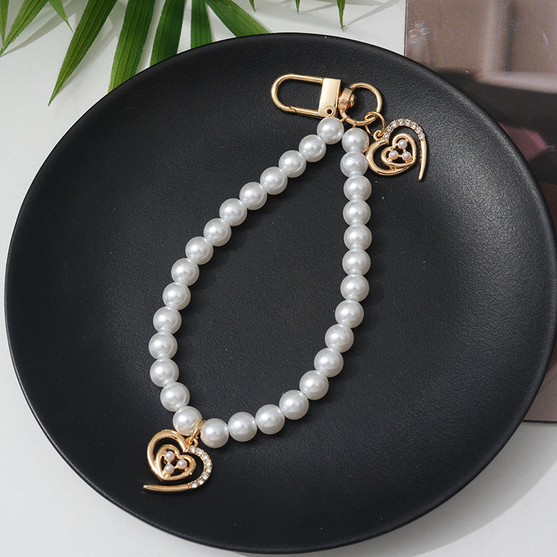Elegant Pearl Bracelet Bowlift