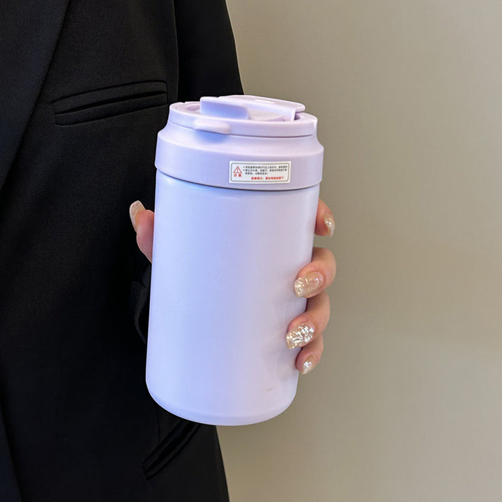 Women's insulated mug with practical spill protection and comfortable carrying handle Bowlift