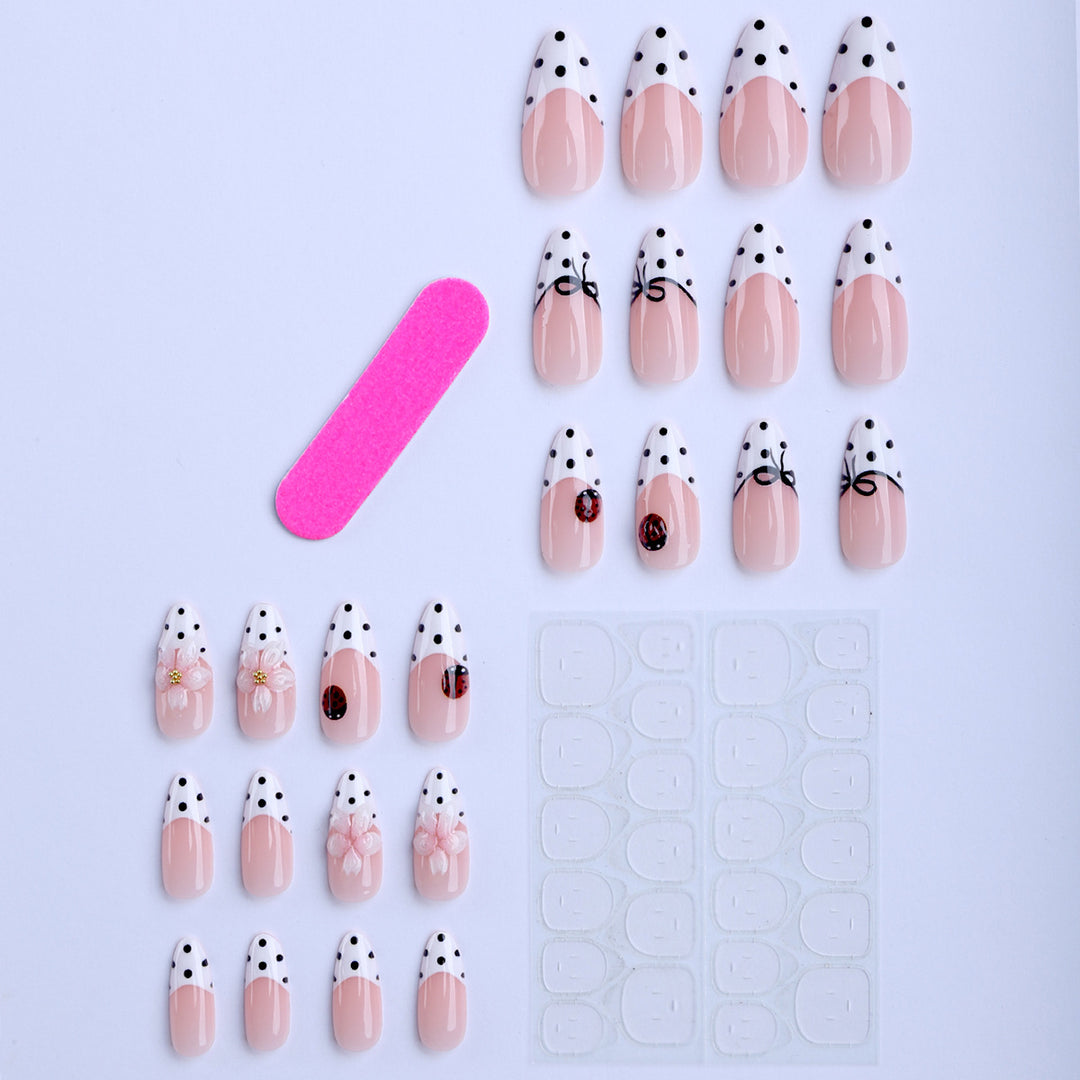 Artificial nail art with floral and playful accents Bowlift