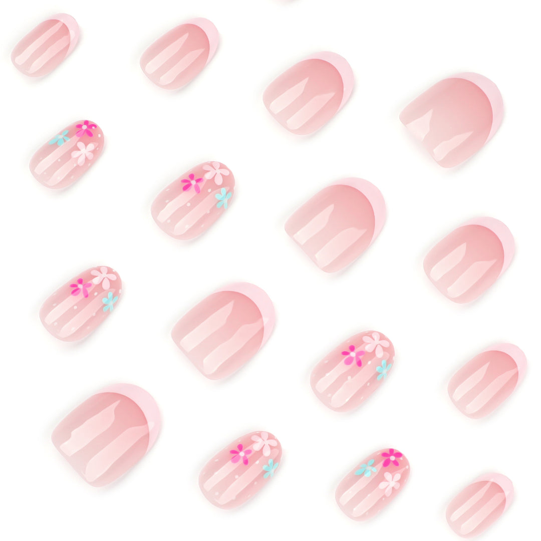 Artful nail extensions with colorful floral designs and glitter Bowlift