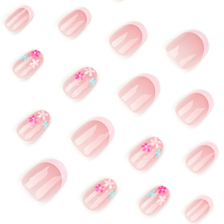 Artful nail extensions with colorful floral designs and glitter Bowlift