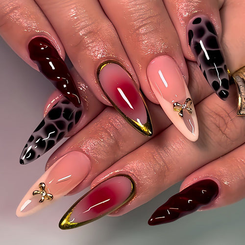 Artistic Stiletto Press-On Nail Set with Unique Accents Bowlift