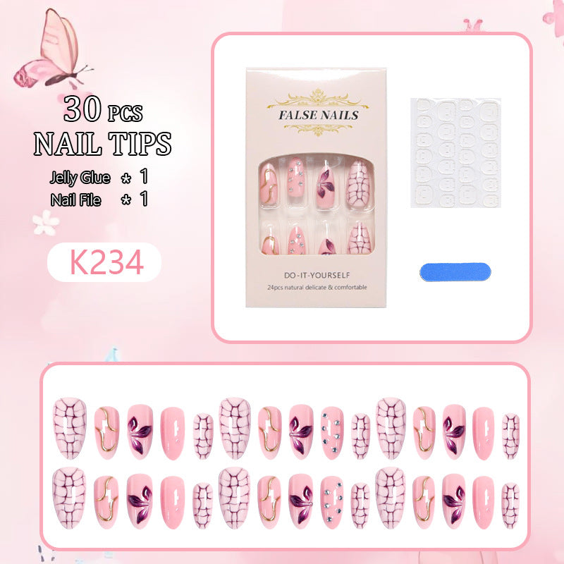 Acrylic nail set with glamorous design and sparkling accents Bowlift