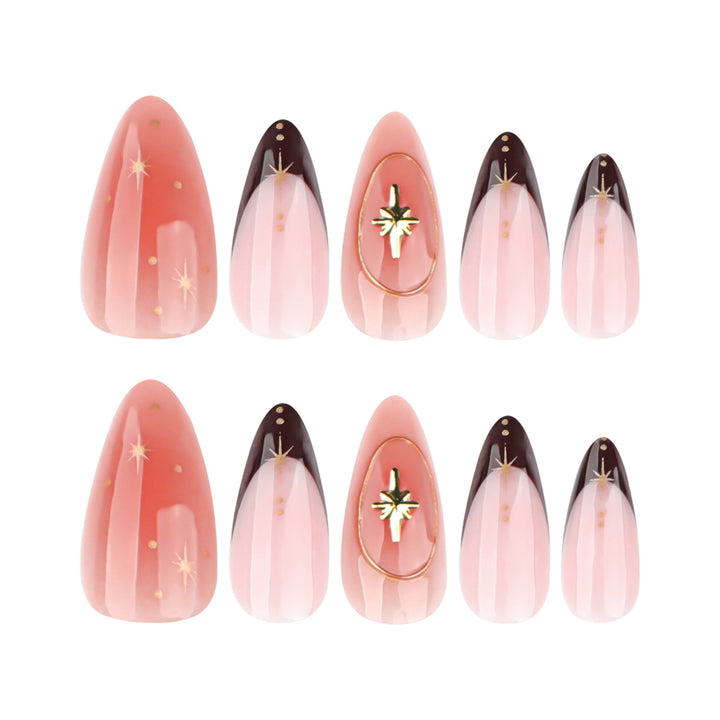 Artful stiletto nails with elegant gold embellishments Bowlift