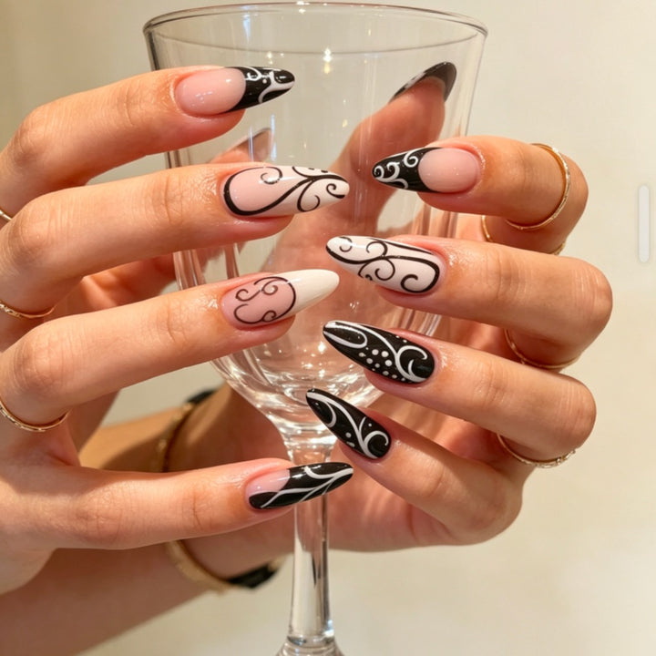 Artistic Stiletto Press-On Nails with Intricate Patterns Bowlift