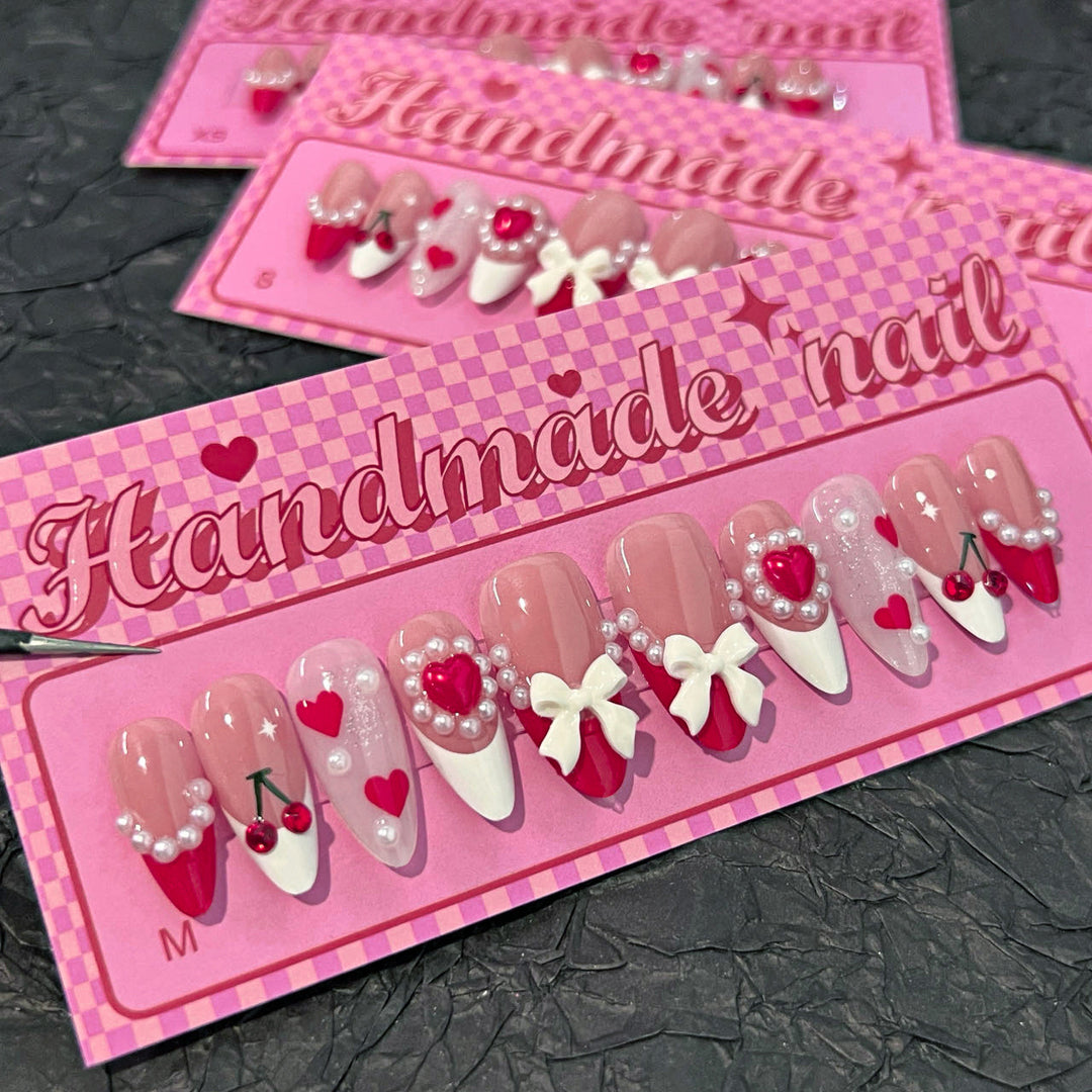 Artful Handmade Nail Art with Hearts and Ribbons Bowlift