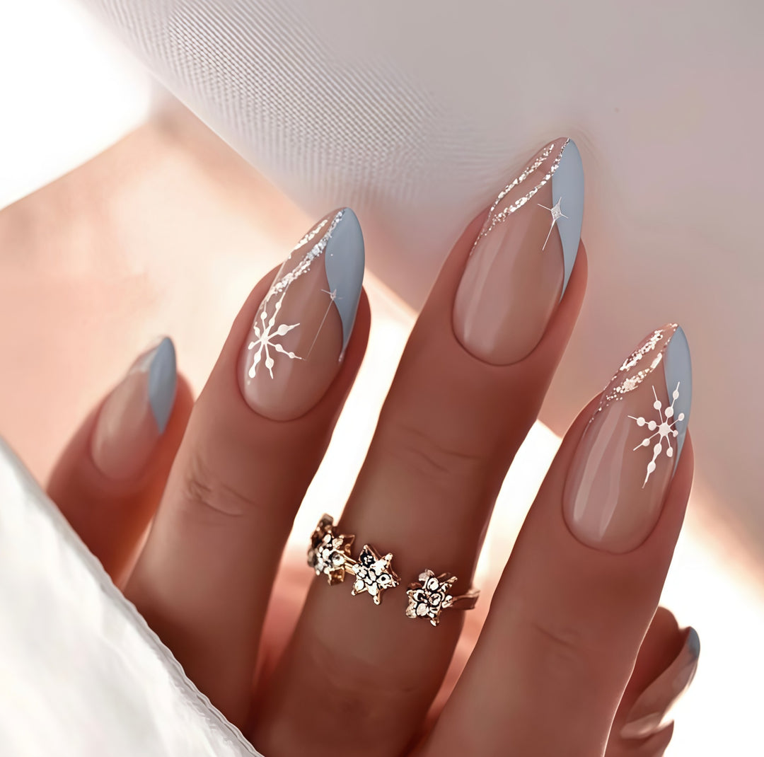 Artistic nail embellishment with snowflake accents Bowlift