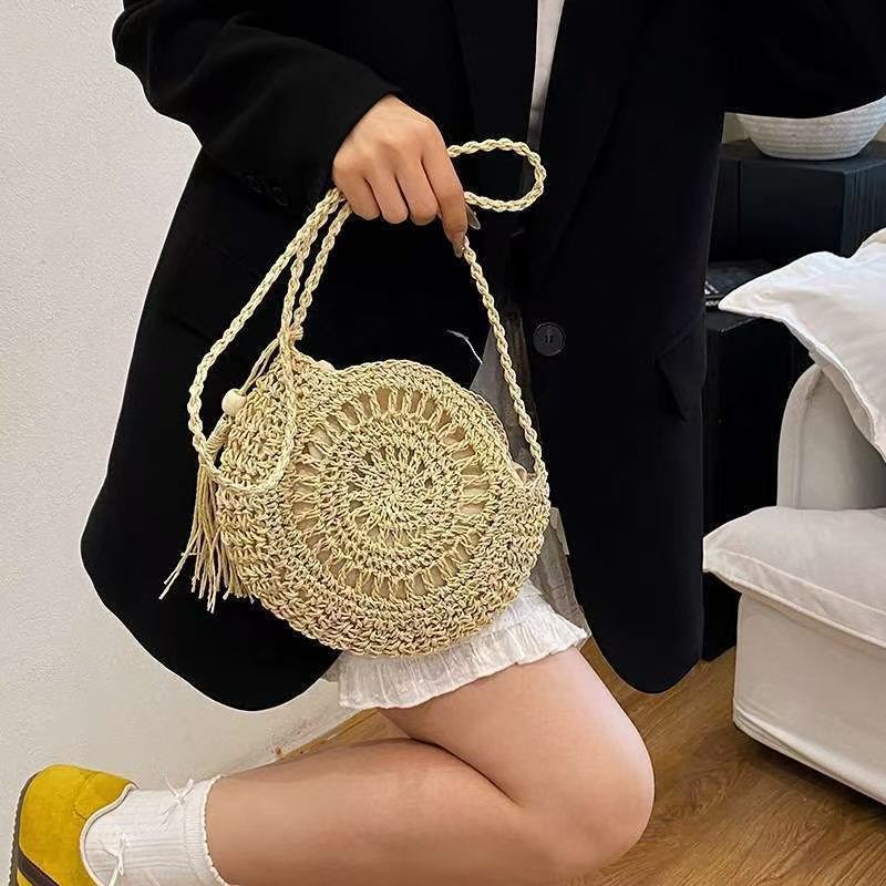 Hand-knotted round shoulder bag made of natural materials Bowlift