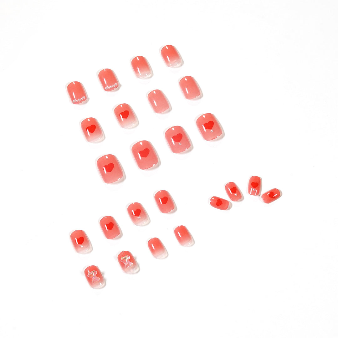 Artful nail art with radiant shine and heart motifs Bowlift