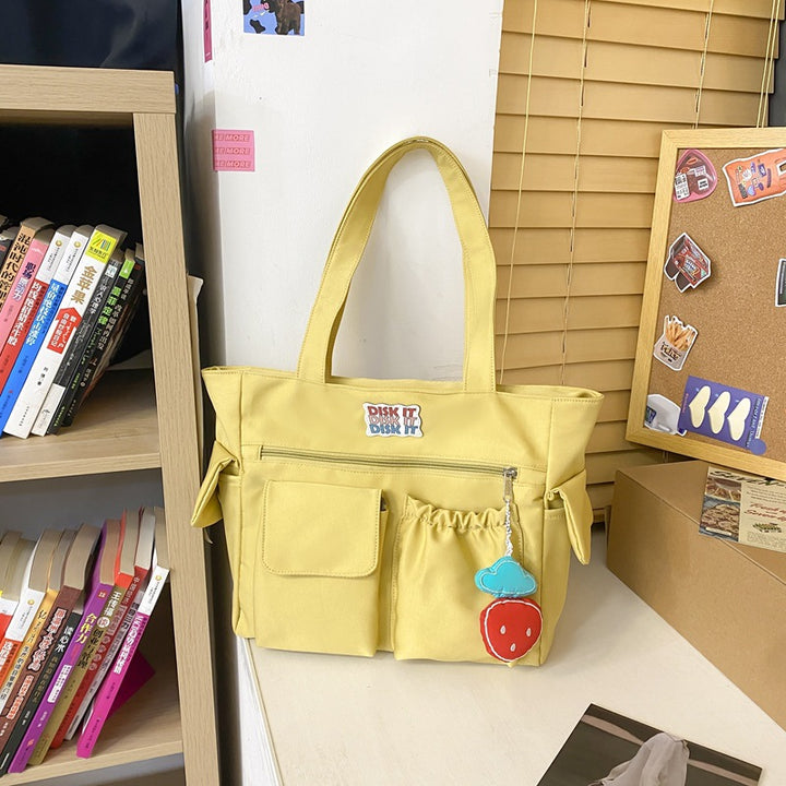 Tote bag with versatile compartments and ergonomic design Bowlift