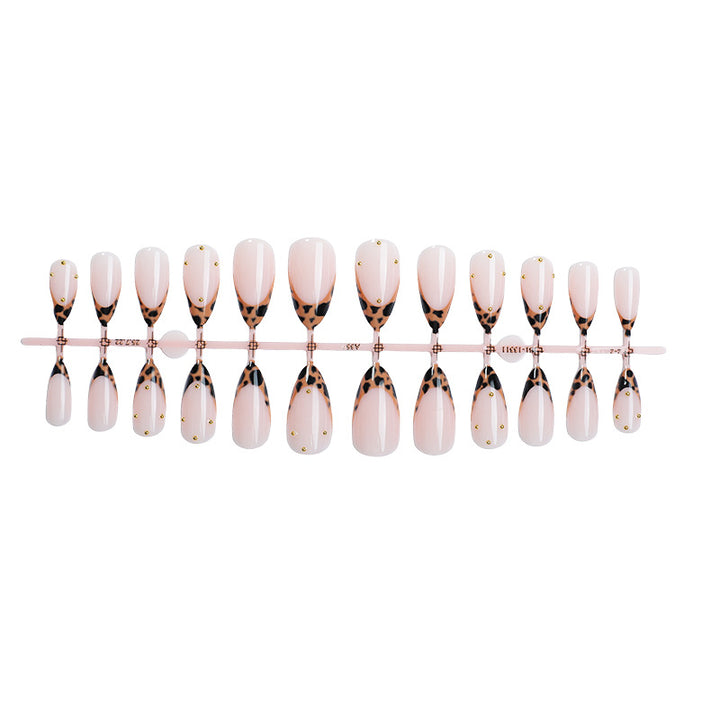 Artificial nail set with elegant leopard pattern and golden accents Bowlift