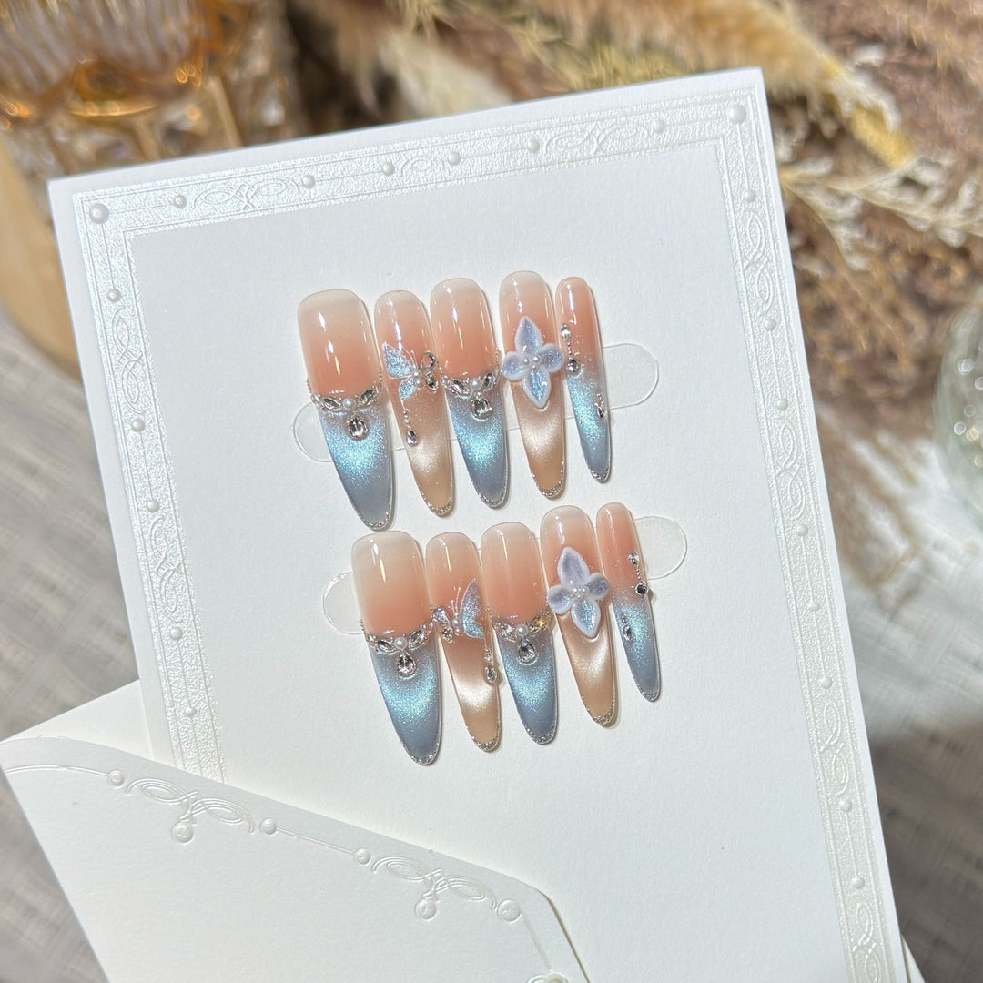 Artistic Press-On Nail Set with Floral and Gemstone Accents Bowlift