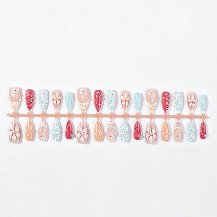 Artificial nail set with floral 3D design and glitter accents Bowlift
