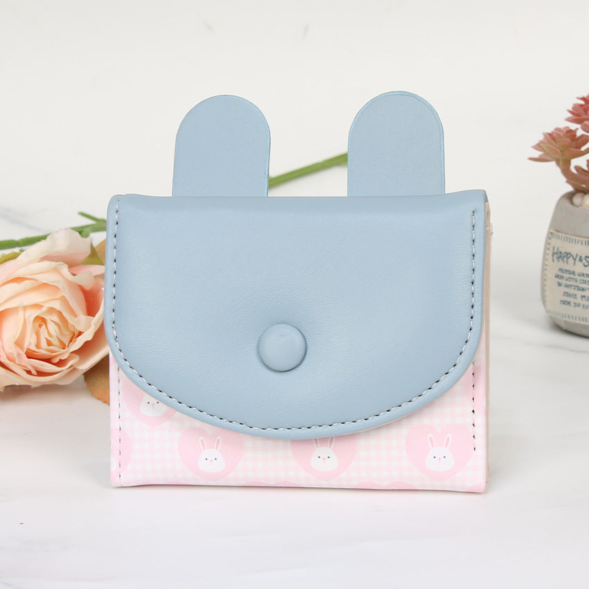 Compact rabbit-themed coin purse with snap closure and card slots Bowlift
