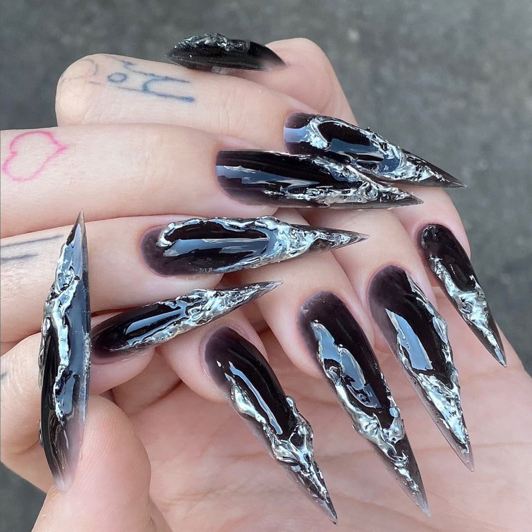 Artistic stiletto nails with modern metal effect Bowlift