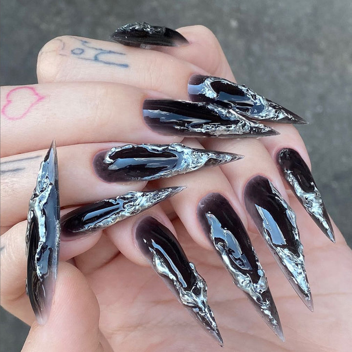 Artistic stiletto nails with modern metal effect Bowlift