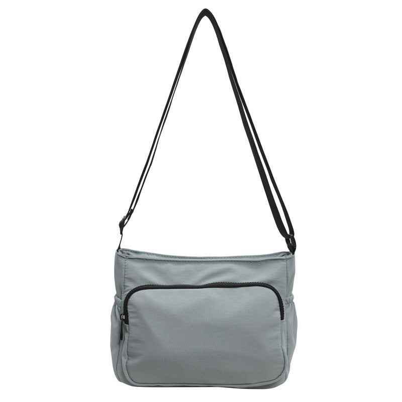 Practical shoulder bag with versatile storage compartments Bowlift