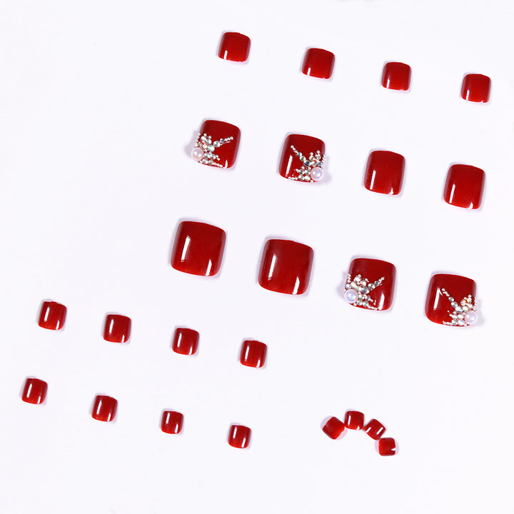 Artful toenail design with elegant rhinestone design Bowlift
