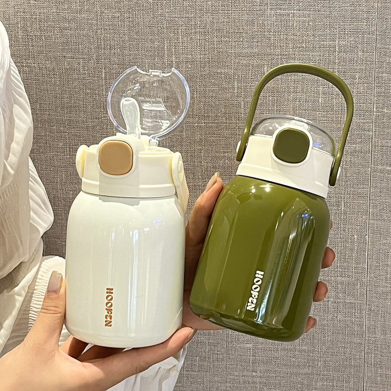 Women's insulated drinking container with practical carrying handle and cute design Bowlift
