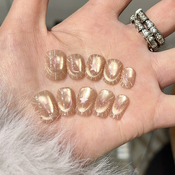 Shiny artificial nail tips with romantic shimmer Bowlift